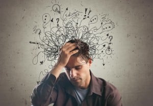 Anxious man with lots of thoughts in his head